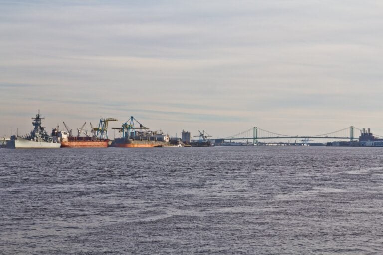 Boats on the river with the bridge in the background