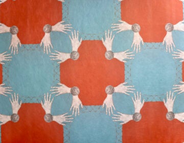 a fabric shows a pattern of hands, circles and plus signs