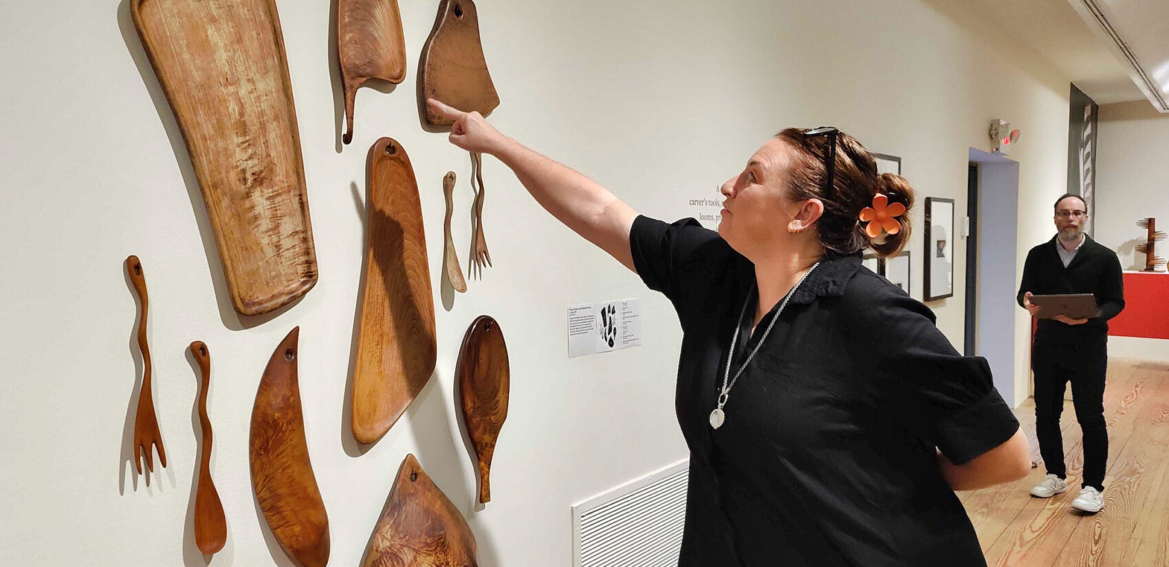 Amanda Burdan points out the housewares made by Wharton Esherick