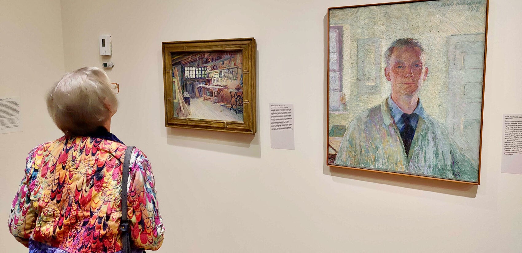 A visitor to the Brandywine Museum looks at Wharton Esherick's self-portrait