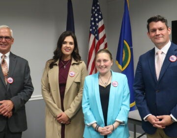 All four candidates posing for a photo together