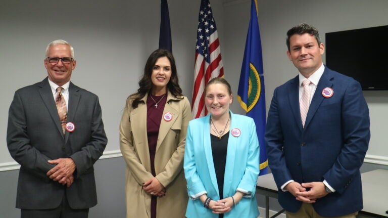 All four candidates posing for a photo together