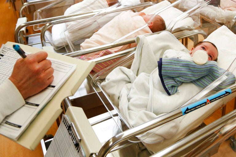 This Feb. 16, 2017 file photo shows newborn babies in the nursery of a postpartum recovery center in upstate New York. U.S. birth rates dropped for the fifth year in a row in 2019, producing the smallest number of babies in 35 years, according to numbers which were released Wednesday, May 20, 2020, by the Centers for Disease Control and Prevention. (AP Photo/Seth Wenig, File)