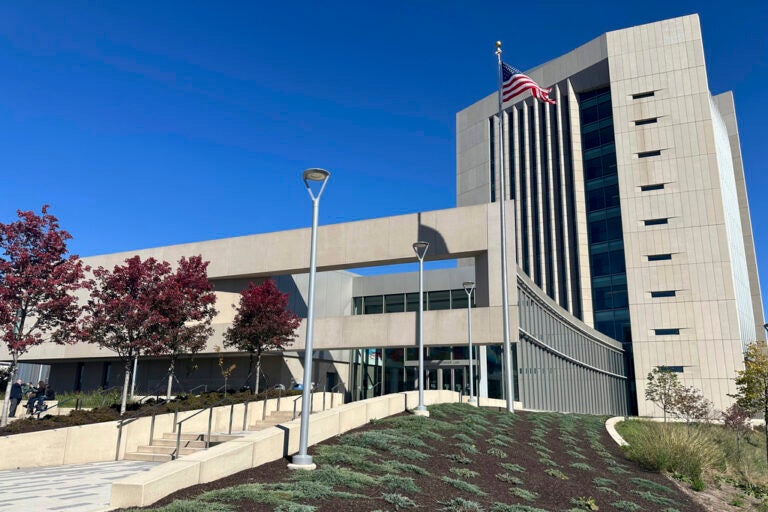 The exterior of the federal courthouse in Harrisburg, Pa., is shown Friday, Oct. 18, 2024, where a judge heard argument regarding a request by six Republican members of Congress that he direct elections officials to take additional steps to verify the identity and eligibility of overseas voters, including those serving in the military and their families. (AP Photo/Mark Scolforo)