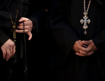 Nuns attend the procession of Saint Dimitrie Bassarabov, the patron saint of the Romanian capital, in Bucharest, Romania, Thursday, Oct. 24, 2024. (AP Photo/Andreea Alexandru)