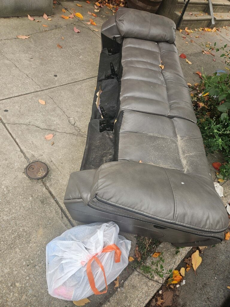 a couch on the curb