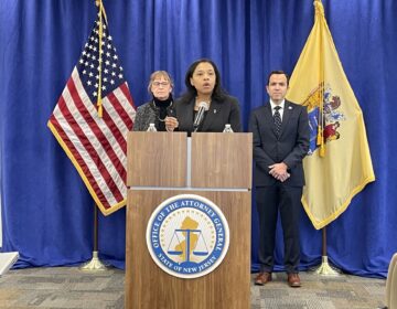 Tahesha Way speaks behind a podium