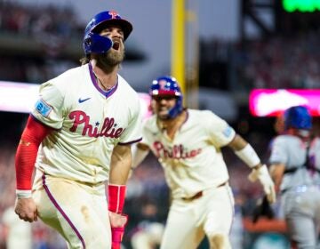 Philadelphia Phillies' Bryce Harper, left, and Nick Castellanos