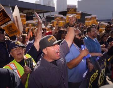 Teamsters and workers hold a rally