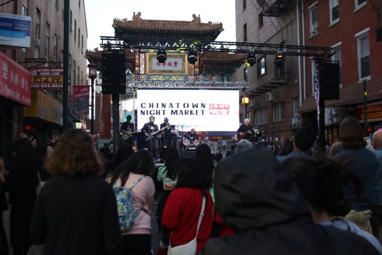 a band plays to a crowd