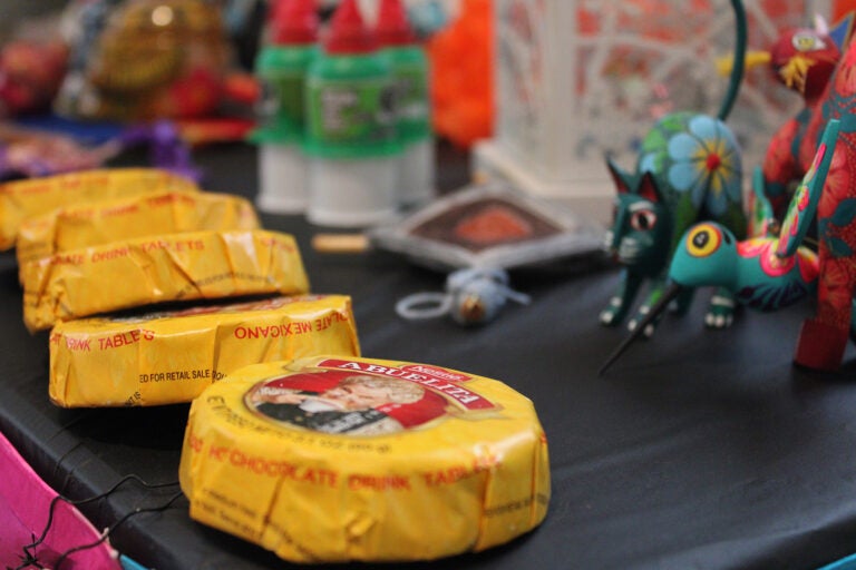 Placing food items that a deceased loved one enjoyed on an altar, or ofrenda, is a common practice during Día de los Muertos. (Emily Neil/WHYY)