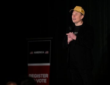 Elon Musk speaks onstage