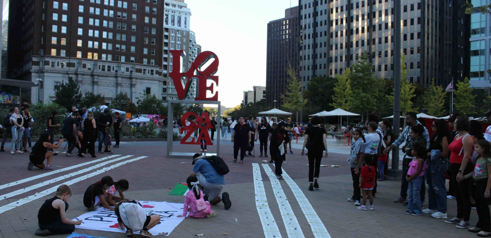 Families for Ceasefire Philly organized a vigil at LOVE Park to remember the Palestinians who have been killed in the Israel-Hamas war. (Emily Neil/WHYY)