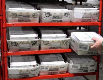 mail ballots on a shelf