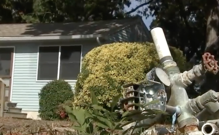 a spout to a well outside a private residence