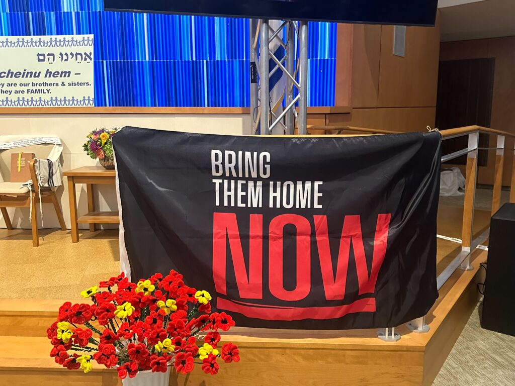 Sign says 'Bring them home now'