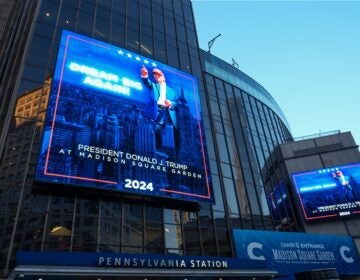 Video boards outside Madison Square Garden say PRESIDENT DONALD TRUMP AT MADISON SQUARE GARDEN 2024