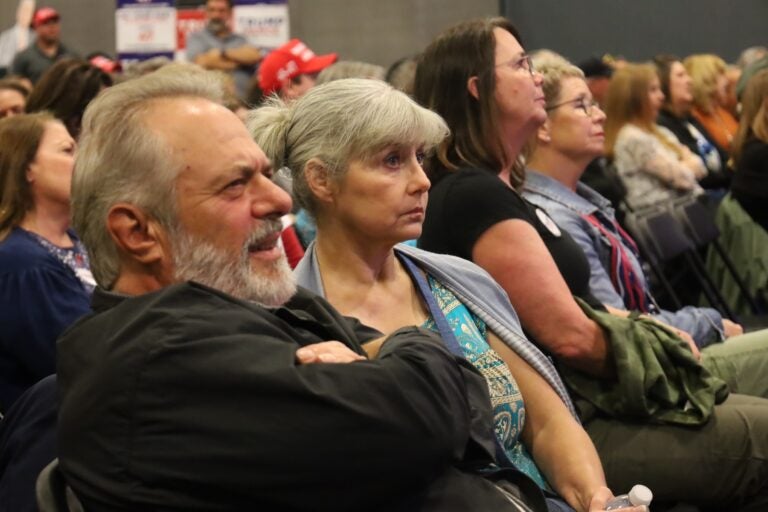 Voters watch the debate at the Republican watch party