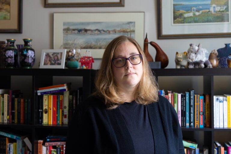 Alaina Johns, a patient that manages medication for multiple conditions, at her home in Philadelphia. (Kimberly Paynter/WHYY)