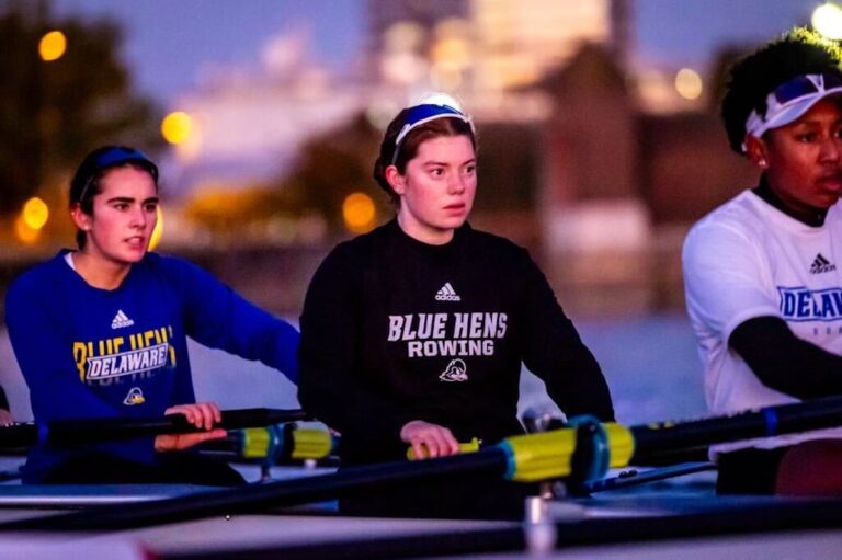 Corinne Carlson (middle) is a student athlete at University of Delaware (Michael Riccio for University of Delaware).