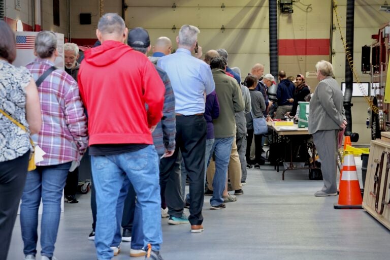 A line stretches out of the firehouse on Main Street in Moorestown Township, New Jersey