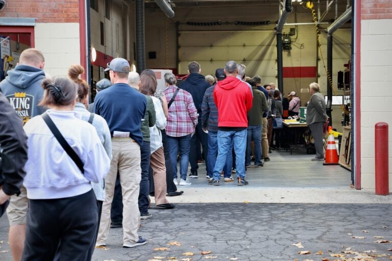 A line stretches out of the firehouse on Main Street in Moorestown Township, New Jersey