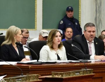 Representatives of SEPTA sit and speak