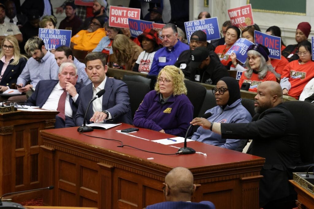 Ryan Boyer and others sit and speak