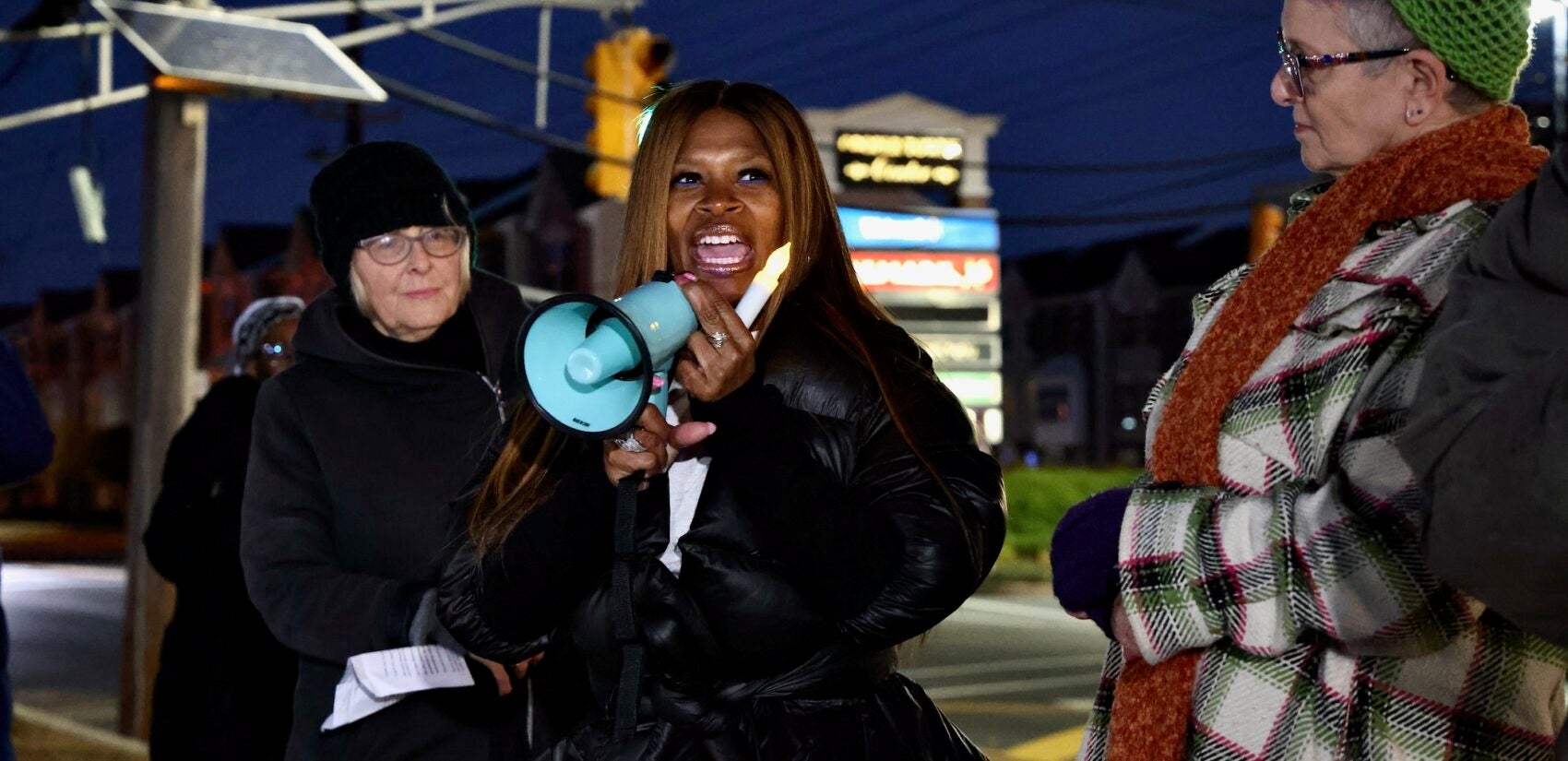 Dawn Hines speaks into a megaphone