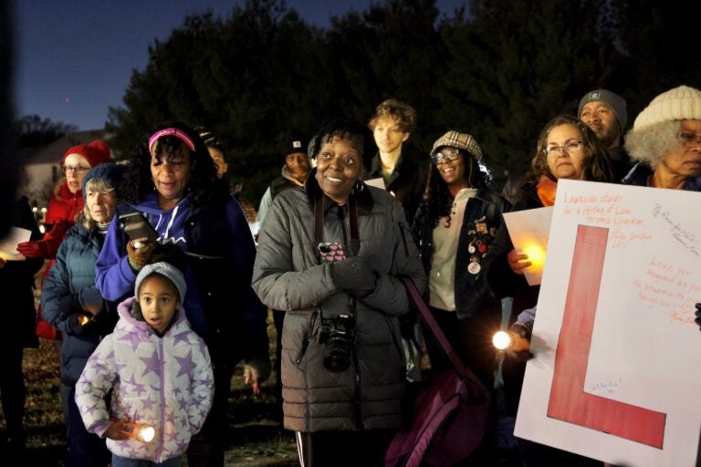 Lawnside residents look on