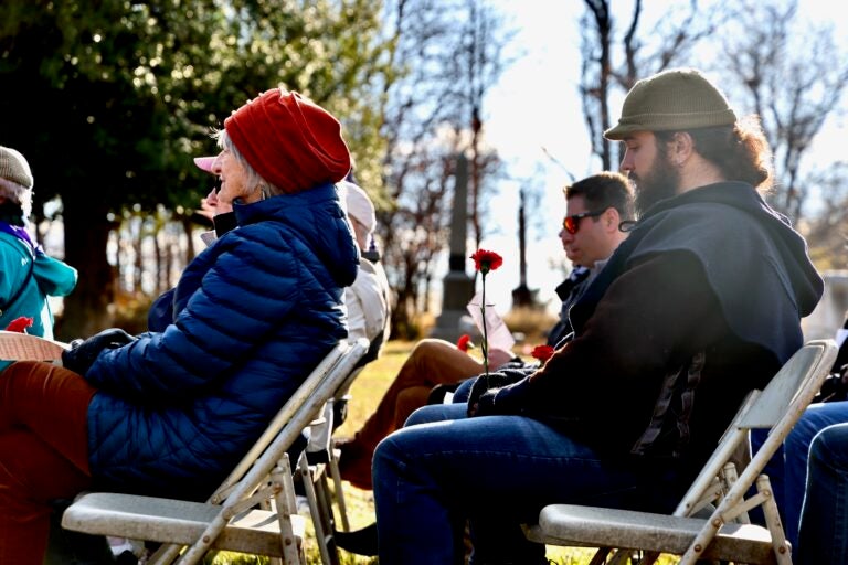 About 30 people attended the reburial ceremony at Mt. Moriah Cemetery in Yeadon, including three descendants of those originally buried in the former First Baptist Church of Philadelpha's former burial ground, which dates back to the early 18th century. (Emma Lee/WHYY)