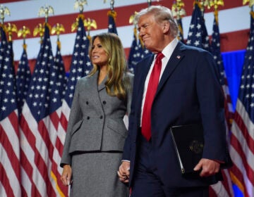 Republican presidential nominee former President Donald Trump stands with former first lady Melania Trump at an election night watch party at the Palm Beach Convention Center, Wednesday, Nov. 6, 2024, in West Palm Beach, Fla. (AP Photo/Evan Vucci)