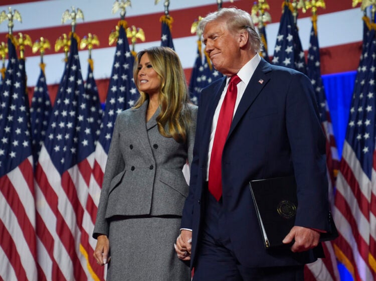 Republican presidential nominee former President Donald Trump stands with former first lady Melania Trump at an election night watch party at the Palm Beach Convention Center, Wednesday, Nov. 6, 2024, in West Palm Beach, Fla. (AP Photo/Evan Vucci)