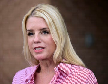 FILE - Pam Bondi, former Florida Attorney General, speaks to reporters outside an election integrity volunteer training, June 18, 2024, in Newtown, Pa. (AP Photo/Derik Hamilton, File)