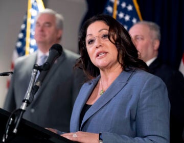 FILE - Rep. Lori Chavez-DeRemer, R-Ore., accompanied by Majority Whip Rep. Tom Emmer, R-Minn., left, and House Majority Leader Rep. Steve Scalise, R-La., right, speaks at a news conference on Capitol Hill in Washington, Jan. 25, 2023. (AP Photo/Andrew Harnik, File)