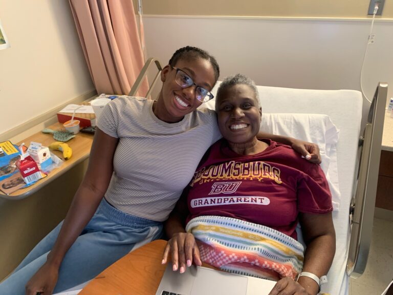 Hannah and Claudine Clarke smile in a hospital bed