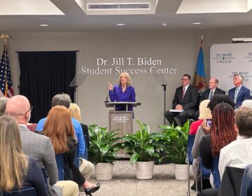 First lady Jill Biden returned to her home state of Delaware to be honored with a plaque at the Student Success Center, recognizing her dedication to higher education and community colleges. Taking the podium, she delivered a heartfelt speech that highlighted her ongoing commitment to education and student success. (Johnny Perez-Gonzalez/WHYY)