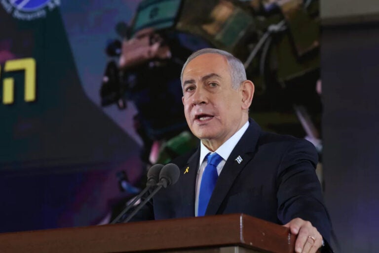 Benjamin Netanyahu speaks at a podium