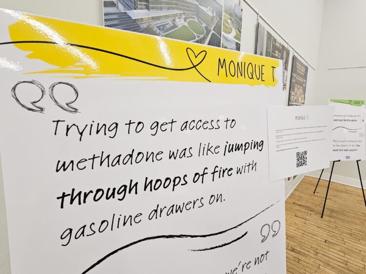 A testimonial from Monique T. on a sign