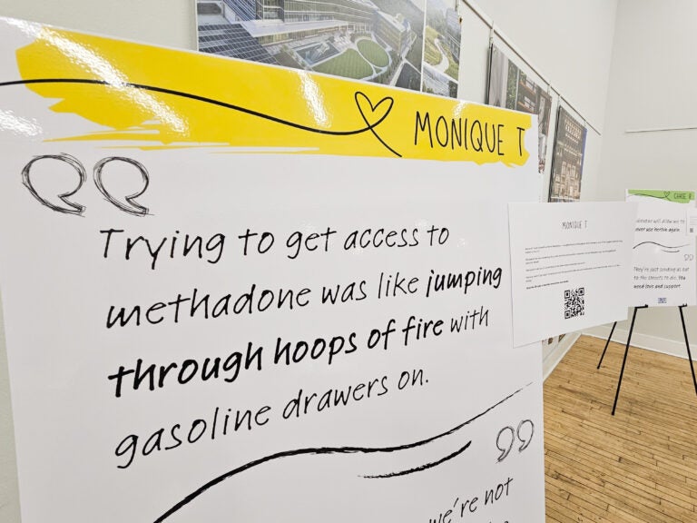 A testimonial from Monique T. on a sign