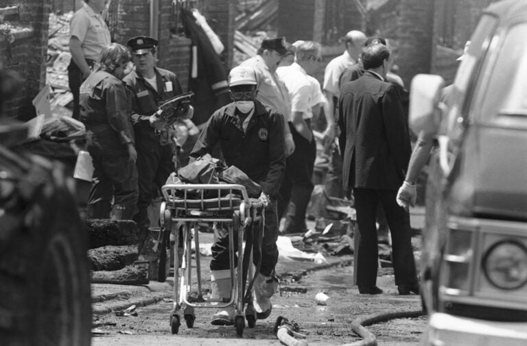 US MOVE Bombing Remains A worker transports the remains of a body found within the debris of the house of the MOVE compound in West Philadelphia