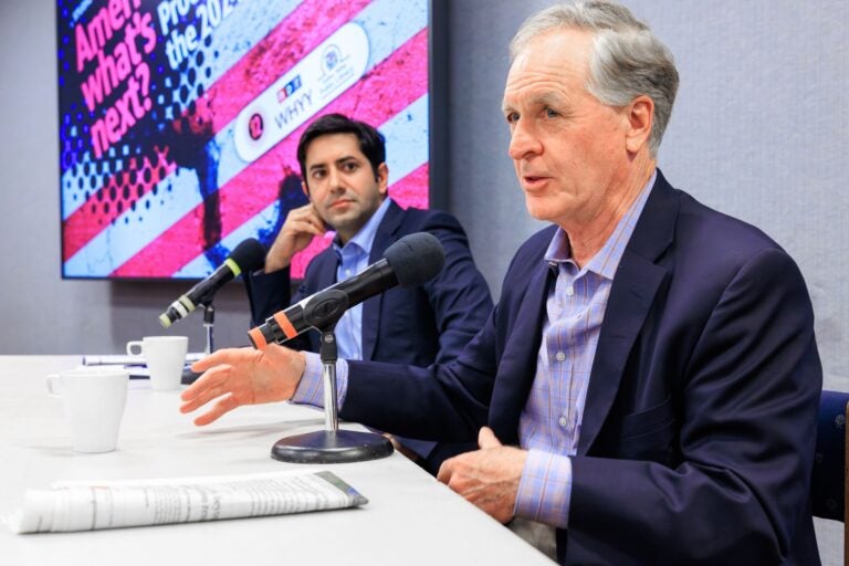 On the left sits Democratic Montgomery County Commissioner Neil Makhija. On the right is is former Pennsylvania Gov. Mark Schweiker, a Republican Bucks County native.
