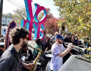 Snacktime performs outside the polling place at Penrose Recreation Center as part of the Joy to the Polls campaign.