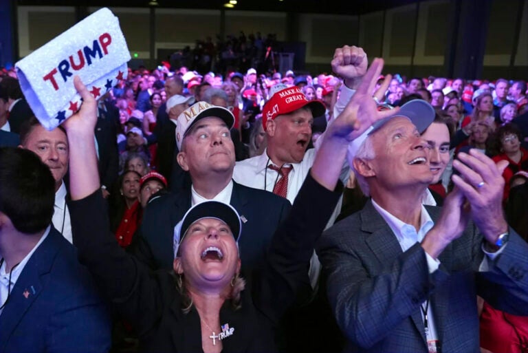 Supporters watch returns at a campaign election night watch party for Republican presidential nominee former President Donald Trump at the Palm Beach Convention Center. (Evan Vucci/AP/AP)