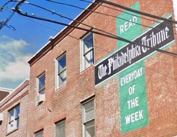 Sign on a building for The Philadelphia Tribune