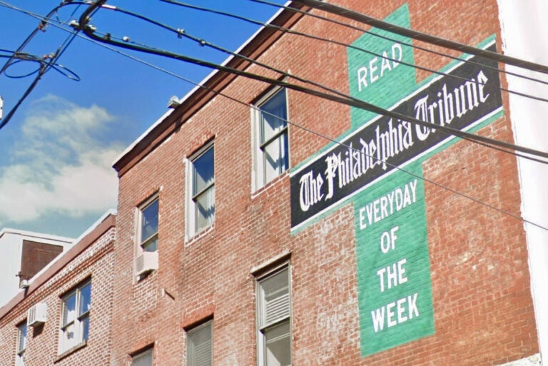 Sign on a building for The Philadelphia Tribune