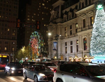 Around 70 cars disrupted traffic on Market Street in response to Philadelphia City Council approving legislation that could pave the way for the 76ers $1.3 billion proposed arena to be built. (Cory Sharber/WHYY)