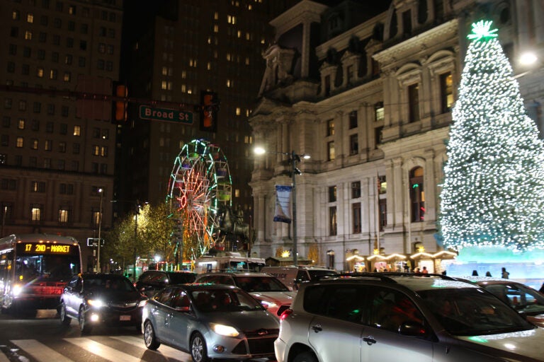 Around 70 cars disrupted traffic on Market Street in response to Philadelphia City Council approving legislation that could pave the way for the 76ers $1.3 billion proposed arena to be built. (Cory Sharber/WHYY)