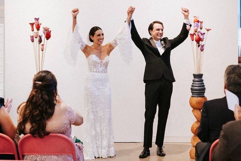 Mark Sfirri's son and wife at their wedding