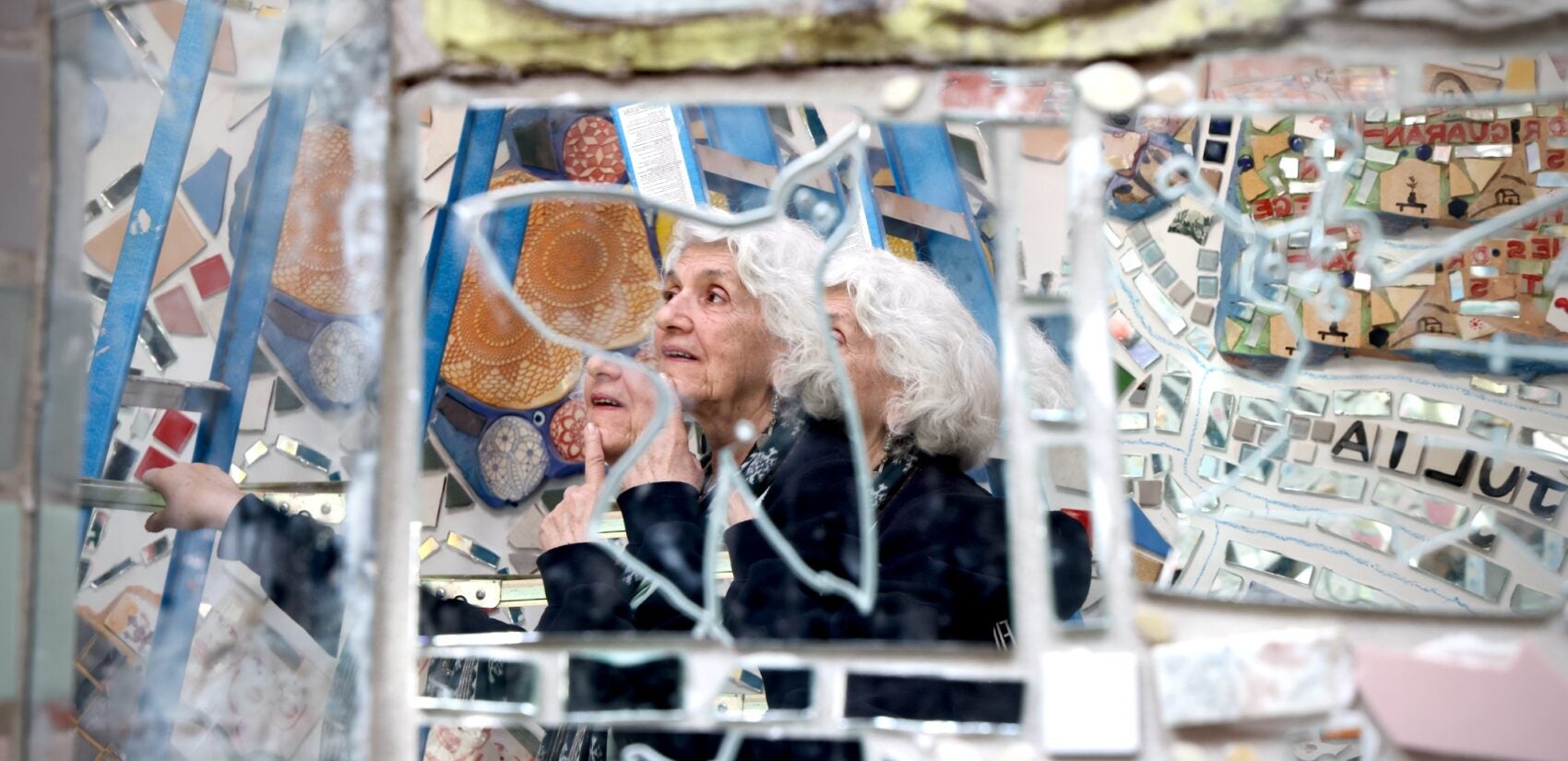 Julia Zagar reflected in mirrored tile